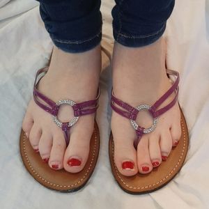 Pink and brown flip flops